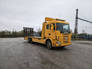 Scania R 124 with ramp car transporter