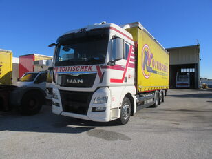 MAN TGX 26440 6X2 / EURO 6 curtainsider truck